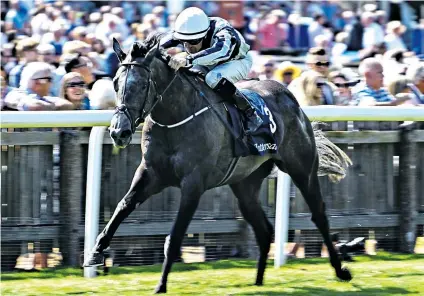  ??  ?? No contest: Alpha Centauri romps to victory in the Tattersall­s Falmouth Stakes at Newmarket, easing home by 4½ lengths