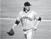  ?? KATELYN MULCAHY GETTY IMAGES ?? Jeff Samardzija pitched against the Padres Friday night and was waived by the Giants on Saturday.