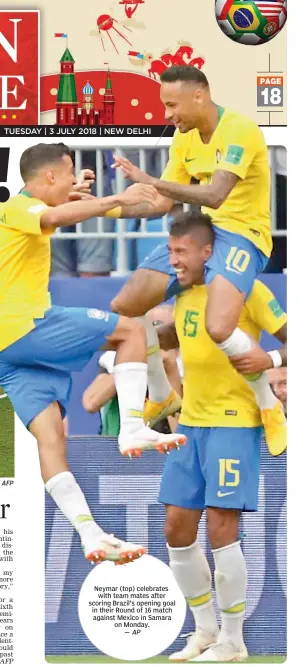  ?? AP ?? Neymar ( top) celebrates with team mates after scoring Brazil’s opening goal in their Round of 16 match against Mexico in Samara on Monday. —