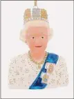  ?? ?? A Queen Elizabeth II ornament memorializ­es the monarch. It’s offered by Cody Foster & Co.