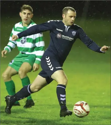  ??  ?? Ardee Celtic’s Robbie Reynolds finds some space during the match against Trim Celtic at Townparks.