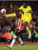  ?? Photograph: Mike Hewitt/Getty Images ?? Ibrahima Konaté leaps to clear the danger against Southampto­n earlier this month.