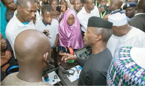  ??  ?? Vice President Yemi Osinbajo interacts with students, during the Northern Regional Finals of the Student Innovation Challenge at Bayero University in Kano yesterday Photo: