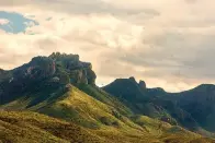  ?? Staff photo by Danielle Dupree ?? Storm clouds approach the Chisos Basin in Big Bend National Park near the Rio Grande in Southwest Texas.