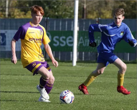  ??  ?? Jake Kearney on the ball for the Wexford Football League during their impressive 7-1 win over Wicklow.