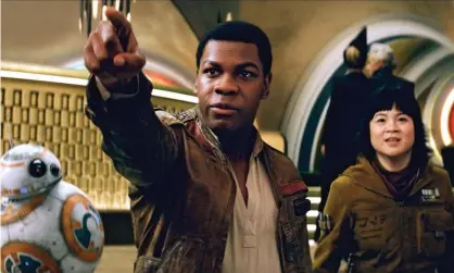  ??  ?? Under attack – by trolls ... John Boyega and Kelly Marie Tran in Star Wars: The Last Jedi. Photograph: Allstar/Lucasfilm/Walt Disney Pictures