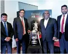  ??  ?? Rasmi Raheem (second from left), Chairman of Ebony Holdings handing over the sponsorshi­p package to Anura de Silva, President of FFSL. Looking on are, Mohamed Musfir (left), Marketing Manager of Ebony Holdings and Jaswar Umar (right), Secretary of FFSL