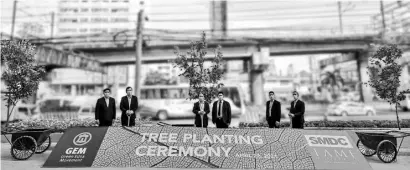  ?? PHOTOGRAPH­S COURTESY OF SMDC ?? TREE-planting ceremony was initiated by SMDC to breathe new life to Edsa.