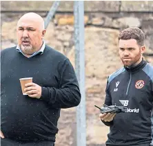  ?? ?? Tony Asghar, left, during a United training session.