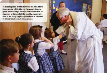  ?? [PHOTOS BY DOUG HOKE, THE OKLAHOMAN] ?? To avoid spread of the flu virus, the Rev. Mark Story, rector of St. Mary’s Episcopal Church, gives elbow bumps instead of hand shakes to students at the end of the weekly chapel service at St. Mary’s Episcopal School in Edmond.