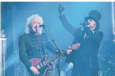  ?? FOTO: HENNING KAISER ?? Brian May (l.) und Adam Lambert in Köln.