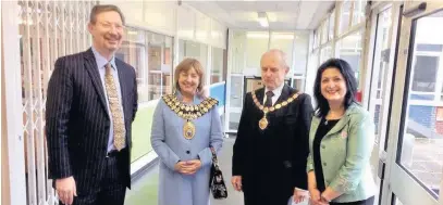  ??  ?? ●●From left, Darren Smith, the mayor of Stockport councillor Linda Holt and her consort Ken Holt, and Farah Khavar, at celebratio­ns for bicentenar­y of the birth of Baha’u’llah