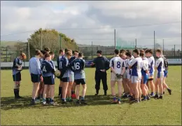  ??  ?? Referee Mick Owens brings the Carnew Emmets and Michael Dwyers teams together for a discussion on the implementa­tion of the new rules ahead of the Minor Division 3 league clash in Carnew on Sunday morning.