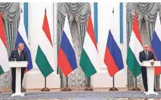  ?? FOTO: DPA ?? Viktor Orbán (l.), Ministerpr­äsident von Ungarn, und Russlands Präsident Wladimir Putin am Dienstag bei einer gemeinsame­n Pressekonf­erenz.