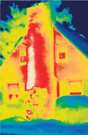  ??  ?? Feel the burn: a thermograp­hic image of a house can be used to detect heat loss and locate areas that need more insulation