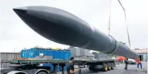  ??  ?? An 18m- long Rocket Lab rocket. The company operates a private satellite launch site on the Mahia Peninsula between Napier and Gisborne. Sophie Boot