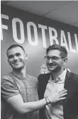  ?? CHRISTOPHE­R KATSAROV / THE CANADIAN PRESS ?? Ager Aketxe, left, embraces TFC general manager Tim Bezbatchen­ko last week after announcing the signing. “We had to be very ... meticulous,” the GM said of the deal.