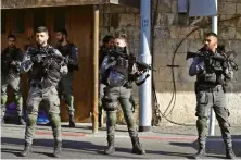  ?? AFP ?? Israeli forces deploy near a school in the Sheikh Jarrah neighborho­od in Israeliocc­upied East Jerusalem on Wednesday following a stabbing attack.