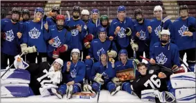  ?? CHERIE MORGAN PHOTOGRAPH­Y/Special to The Herald ?? Members of the Penticton Vees pose for a group shot after the annual Peaches Cup game this past Saturday. The club opens its exhibition schedule this Friday at home.