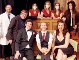  ??  ?? Filming pro-vaccinatio­n song “Comeback” at the Poowong Public Hall are (standing, from left) Scott Lawrence, Malcolm McCaffery, Emily Laughlin, Jayde Richardson, Kiarna Smith, Lochlan Costello, (front, from left) Dave Lamb, Adrian Darakai and Steph Powell.