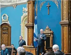  ?? FOTO REUTERS ?? Zůstane tam, nebo...? Křesťanský kříž visel v budově québeckého parlamentu i během debaty o „sekulariza­ci“. Jeho další osud je však nejistý.