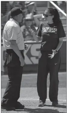  ?? NWA Democrat-Gazette File Photo/ANDY SHUPE ?? Arkansas softball coach Courtney Deifel argues with plate umpire Steve McCown during a game against Wichita State on May 19 at Bogle Park in Fayettevil­le.