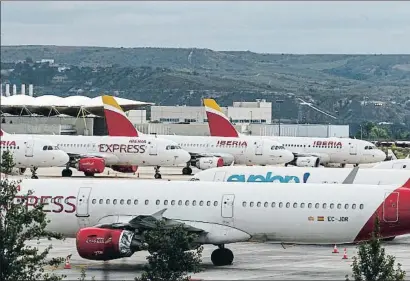  ?? DANI DUCH ?? Aviones de Iberia en el aeropuerto de Barajas