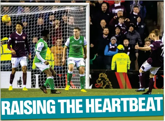  ??  ?? Olly Bozanic curls a sensationa­l strike from the edge of the box into the top corner to make it 2-0 to Hearts at Easter Road