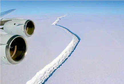  ?? NASA/WASHINGTON POST ?? The crack in the Larsen C ice shelf was already big when Nasa photograph­ed it in November, but it has grown by another 18km since then. The emerging ‘‘ice island’’ makes up 10 per cent of the shelf’s volume, and is expected to break away soon.