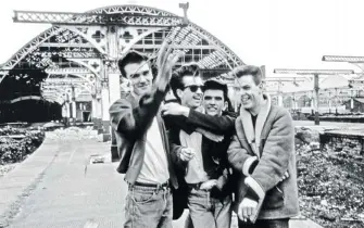  ?? RANDOM HOUSE CANADA ?? The Smiths: Morrissey, left, Johnny Marr, Mike Joyce and Andy Rourke. Tony Fletcher’s account of the band may well be the only rock biography to give Friedrich Engels significan­t space.