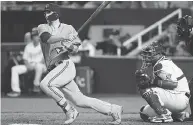  ?? COLIN E. BRALEY / THE ASSOCIATED PRESS ?? Toronto catcher Danny Jansen, left, laced a single in his first major league start on Monday in Kansas City,