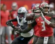  ?? TIM IRELAND - THE ASSOCIATED PRESS ?? Tampa Bay Buccaneers quarterbac­k Jameis Winston (3) passes against the Carolina Panthers during the second quarter of an NFL football game, Sunday, Oct. 13, 2019, at Tottenham Hotspur Stadium in London.