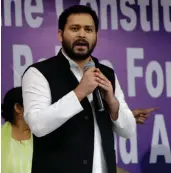  ?? — PTI ?? RJD’s Tejashwi Yadav speaks at the protest venue of West Bengal chief minister Mamata Banerjee against the recent raids by CBI in Kolkata on Tuesday.