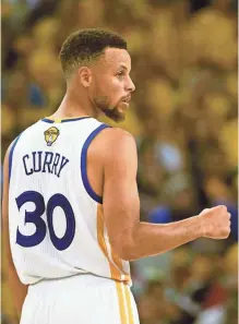  ?? KYLE TERADA, USA TODAY SPORTS ?? Stephen Curry was in fine form Sunday, with 32 points, 11 assists and 10 rebounds in the Warriors’ Game 2 Finals win.