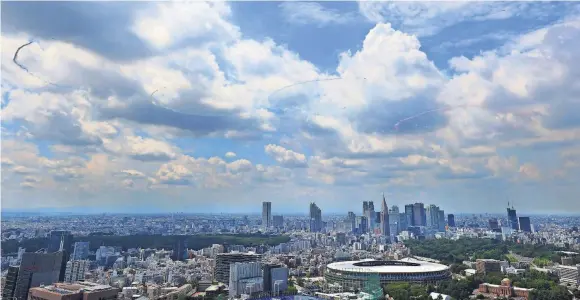  ?? FUMIYASU NAKATSUJI/AFP VIA GETTY IMAGES ?? The Tokyo Olympics officially started on Friday amid continuing concerns over the spread of COVID-19 throughout the Games.