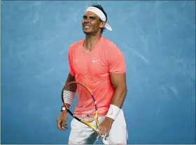  ?? THE ASSOCIATED PRESS ?? Rafael Nadal reacts after losing a point against Stefanos Tsitsipas during their quarterfin­al match at the Australian Open.