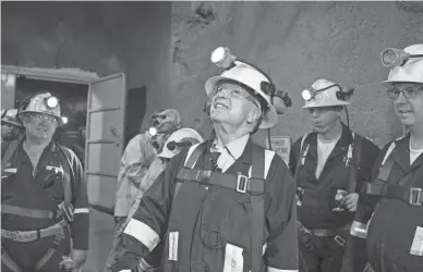  ?? MARK HENLE/THE REPUBLIC ?? Sen. John McCain tours the Resolution Copper mine near Superior in 2014. McCain was instrument­al in getting a land swap added to a spending bill to allow the massive mining project to move forward.