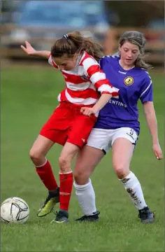  ??  ?? Alannah Anglim applies pressure on Cork’s Kara Lacey.