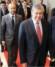  ??  ?? Ahmad Zahid in Langkawi for the Asean meeting accompanie­d by Kedah Mentri Besar Datuk Seri Mukhriz Mahathir.