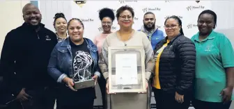  ?? ?? Gwynne Harding (centre), manager of Mossel Bay Municipali­ty’s Local Economic Developmen­t Office, and her award-winning team.