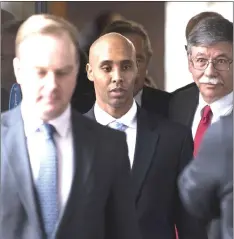  ??  ?? Mohamed Noor (centre) and his legal team exit the Hennepin County Government Center in Minneapoli­s. — AFP photo