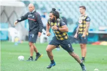  ?? Photo / Getty Images ?? Warriors forward Adam Blair goes through a routine at training at Central Coast Stadium in Gosford.