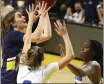  ?? SHMUEL THALER — SANTA CRUZ SENTINEL FILE ?? UC Santa Cruz's Kaylee Murphy left, was named an NCAA Division III Honorable Mention All-American by the Women's Basketball Coaches Associatio­n on Thursday.