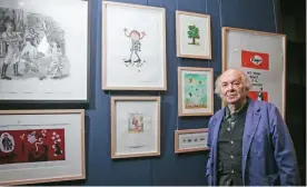  ??  ?? British illustrato­r and artist Quentin Blake poses with some of his work at Sotheby’s auction house.