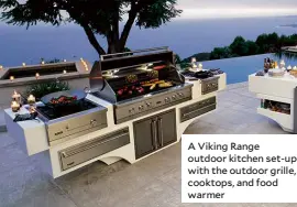  ??  ?? A Viking Range outdoor kitchen set-up with the outdoor grille, cooktops, and food warmer