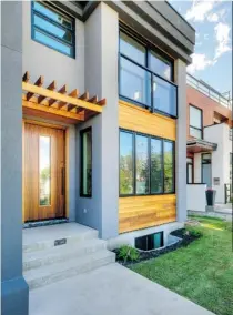  ?? Photos: Maillot Homes ?? The stylishly modern front exterior of the Marda Loop duplex.