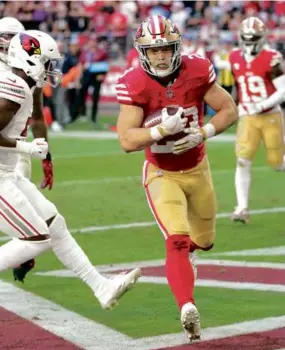  ?? MATT YORK/ASSOCIATED PRESS ?? Christian McCaffrey finished three plays in the end zone for the 49ers, twice on passes from Brock Purdy and another on a run.