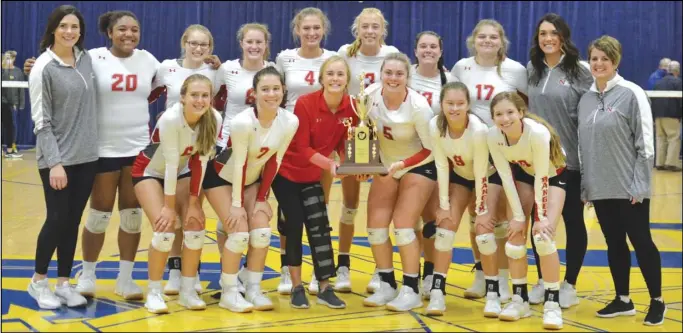  ?? Staff photos/Jake Dowling ?? Above: Players and coaches of the New Knoxville volleyball team pose for a picture with their Midwest Athletic Conference champion trophy after defeating Marion Local on Thursday. Below: New Knoxville head coach Meg Lageman and the Rangers bench celebrate after the team clinched match point.