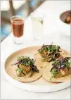  ?? CONTRIBUTE­D BY MIA YAKEL ?? Estrella Tempura Oyster Tacos with tempura fried oysters, dzikilpak, onions and cilantro.