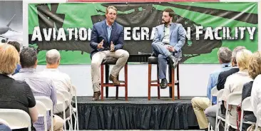  ?? [AP PHOTO] ?? U.S. Sen. Jeff Flake, R-Ariz., left, sits with National Taxpayers Union President Pete Sepp, while speaking to aerospace workers Friday in Mesa, Ariz., about the current congressio­nal tax reform proposal in Congress. Flake told the workers that...